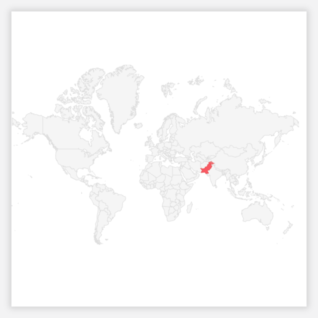 World map with a red dot on a white background